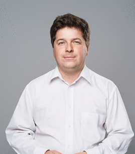 zdjęcie eksperta od dofinansowań - Grzegorz Krzyszczyk